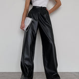 Pantalones anchos de piel sintética: máxima elegancia y comodidad.