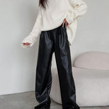 Pantalones anchos de piel sintética: máxima elegancia y comodidad.