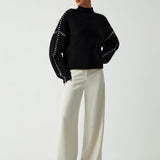 Alma | Suéter Oversize-Dolcevita con detalles de Piqué