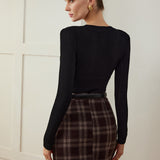 Minifalda de tweed a cuadros