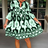 Vestido de mujer - Corte fluido - Mangas 3/4 - Abotonado - Diseño geométrico moderno