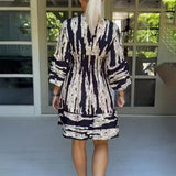 Vestido de mujer - Escote en pico - Mangas 3/4 con volantes - Talle imperio - Corte corto y fluido