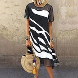 Vestido de mujer - Corte holgado y cómodo - Mangas cortas - Cuello redondo - Estampado moderno
