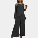 Traje de mujer – Corte relajado – Pantalón ancho – Top asimétrico – Tejido de lujo