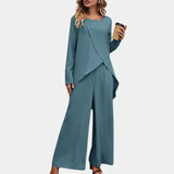 Traje de mujer – Corte relajado – Pantalón ancho – Top asimétrico – Tejido de lujo
