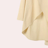 Traje de mujer – Corte relajado – Pantalón ancho – Top asimétrico – Tejido de lujo