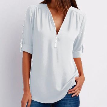 Blusa de mujer – Corte relajado – Cuello en V con cremallera – Mangas abotonadas – Tejido transpirable y fluido