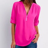 Blusa de mujer – Corte relajado – Cuello en V con cremallera – Mangas abotonadas – Tejido transpirable y fluido