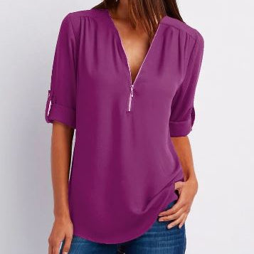 Blusa de mujer – Corte relajado – Cuello en V con cremallera – Mangas abotonadas – Tejido transpirable y fluido