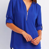 Blusa de mujer – Corte relajado – Cuello en V con cremallera – Mangas abotonadas – Tejido transpirable y fluido