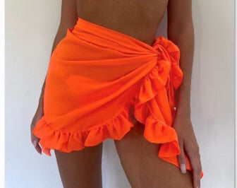 Falda de playa para mujer – Estilo cruzado ajustable – Tejido ligero – Dobladillo con volantes
