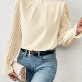 Blusa de mujer – Corte holgado – Cuello alto plisado – Mangas largas en voile de espiga