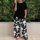 Pantalón ancho para mujer – Corte fluido – Estampado floral – Tejido de lino ligero