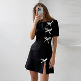 Vestido trapecio para mujer - Mangas cortas - Detalle de lazo - Abertura elegante