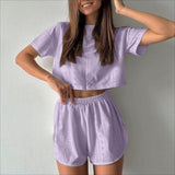 Conjunto de dos piezas para mujer: top corto y shorts, tejido transpirable, corte holgado.