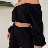 Conjunto de dos piezas para mujer: Top con hombros descubiertos, mangas largas y pantalones anchos de cintura alta.