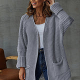 Cárdigan de mujer – Punto grueso – Corte oversize – Cuello en pico – Mangas largas – Bolsillos