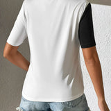 Camiseta de mujer – Corte holgado – Punto suave – Cuello redondo – Detalle de lentejuelas