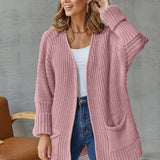 Cárdigan de mujer – Punto grueso – Corte oversize – Cuello en pico – Mangas largas – Bolsillos