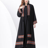 Vestido largo de mujer – Corte fluido – Detalle de tejido étnico con borlas