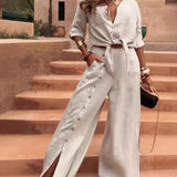 Traje pantalón de mujer – Lino y algodón – Pernera ancha – Cintura ajustable – Botones laterales