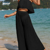 Conjunto de dos piezas para mujer: Top bustier fluido y pantalón ancho de cintura alta.