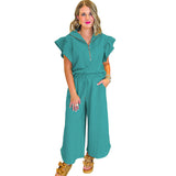 Conjunto informal para mujer: Top con cuello camisero y volantes con cremallera y pantalón ancho con cordón.