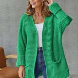 Cárdigan de mujer – Punto grueso – Corte oversize – Cuello en pico – Mangas largas – Bolsillos