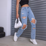 Vaqueros de mujer – Corte relajado – Denim rígido – Roturas desgastadas – Largo completo