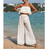 Conjunto de dos piezas para mujer: Top bustier fluido y pantalón ancho de cintura alta.