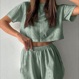 Conjunto de dos piezas para mujer: top corto y shorts, tejido transpirable, corte holgado.