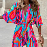 Vestido de mujer corte A – Escote en pico – Mangas murciélago – Bajo asimétrico