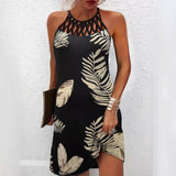 Vestido de mujer con cuello halter – Corte entallado – Detalle de abertura – Estampado de hojas – Mini
