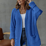 Cárdigan de mujer – Punto grueso – Corte oversize – Cuello en pico – Mangas largas – Bolsillos