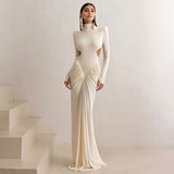 Vestido largo sexy sin espalda y con cuello alto.