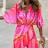 Vestido de mujer corte A – Escote en pico – Mangas murciélago – Bajo asimétrico