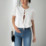 Blusa de mujer – Corte relajado – Tejido transpirable – Mangas abullonadas – Lazos delanteros