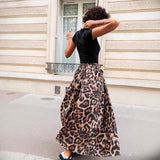 Falda larga de mujer – Pliegues fluidos – Estampado llamativo – Elegante corte acampanado