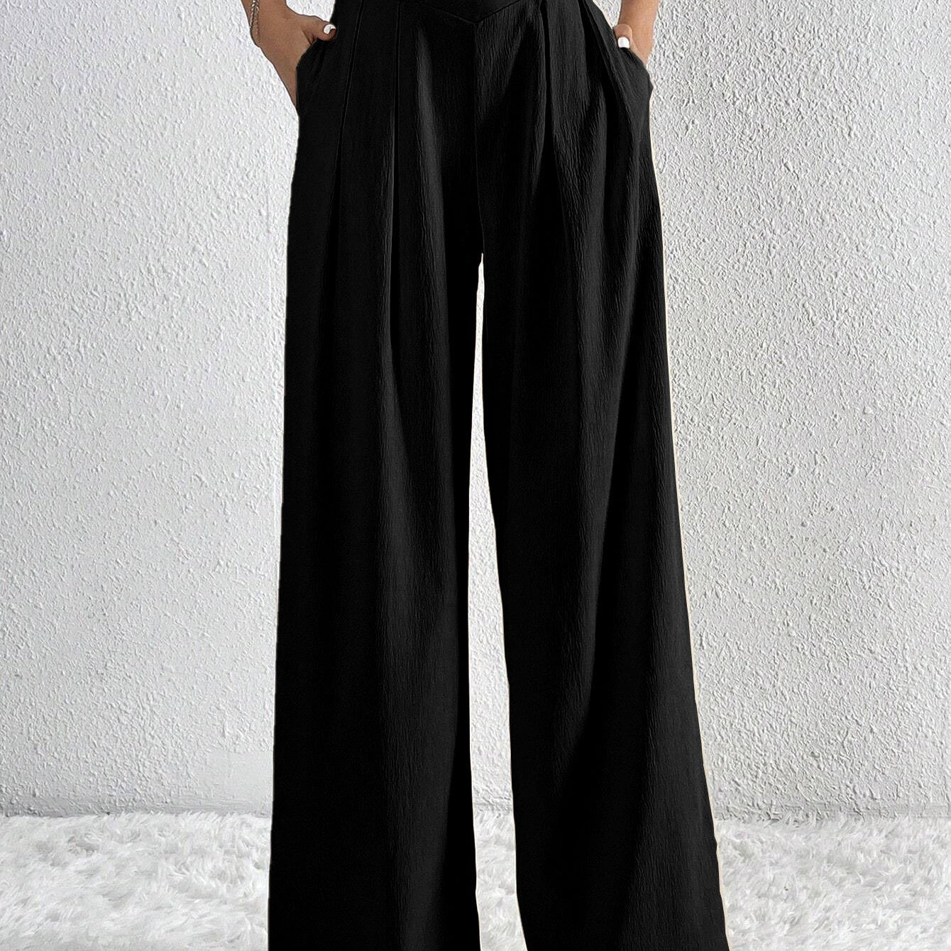 Pantalón ancho de mujer – Cintura alta – Tejido ligero – Corte fluido con pliegues y bolsillos