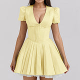 Vestido corto de mujer – Corte evasé – Mangas abullonadas – Cuello en pico – Estampado floral