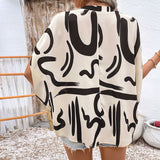 Blusa de mujer – Corte holgado – Mangas murciélago – Cuello en pico – Estampado geométrico