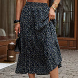 Falda midi de mujer – Corte fluido – Cintura elástica – Estampado floral – Volantes