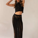 Conjunto de dos piezas para mujer: Top corto transparente, falda midi, corte ajustado y detalles recortados.
