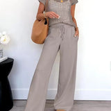 Conjunto de mujer: Top de malla de manga corta y pantalón ancho y fluido