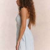 Vestido mini de tirantes con volantes de encaje calado