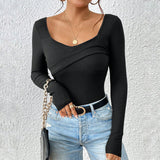 Blusa de mujer – Corte entallado – Tejido elástico acanalado – Diseño cruzado – Mangas largas