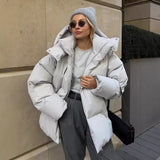 Chaqueta acolchada para mujer – Corte oversize – Capucha – Repelente al agua – Largo hasta la mitad del muslo