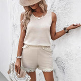 Conjunto de mujer: Top sin mangas y pantalones cortos, punto suave, corte holgado, acabado con flecos.
