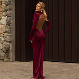 Vestido largo sexy sin espalda y con cuello alto.