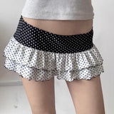 Minifalda ajustada con volantes, patchwork de lunares y bloques de color.